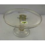 A MID 18TH CENTURY GLASS TAZZA having dished top on Silesian stem, the domed base with folded rim,