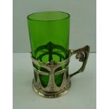 AN ORIVIT ART NOUVEAU PEWTER GLASS HOLDER pierced and cast with leaves and tendrils, complete with