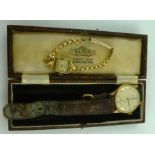 A TIMOR GENTLEMAN'S 9CT GOLD CASED WRIST WATCH secondary dial and Arabic numerals, presentation