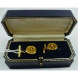 ASPREY & COMPANY A PAIR OF 18CT GOLD AND DIAMOND SET CUFFLINKS, each having a "stitched button"