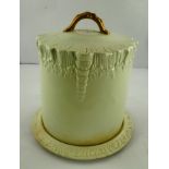 A CARLTON WARE EARTHENWARE STILTON DISH AND COVER, the top with moulded and gilded handle, 32cm high