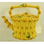 A VICTORIAN WEDGWOOD PORCELAIN BAMBOO DESIGN TEAPOT all over yellow with green shoots, bears