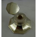 MAPPIN & WEBB A SILVER CAPSTAN INKWELL, having hinged octagonal lid with engine turned border,