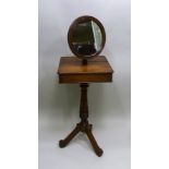 A 19TH CENTURY MAHOGANY SHAVING STAND with adjustable circular mirror above compartment tier, on