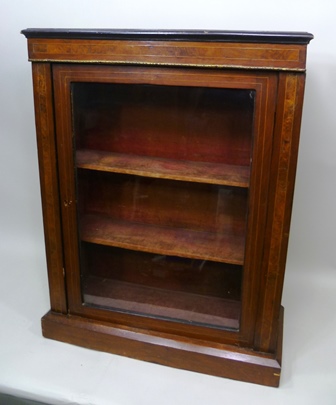 A 19TH CENTURY MAHOGANY PIER CABINET fitted single glazed door on closed base, 75cm wide