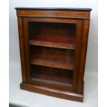 A 19TH CENTURY MAHOGANY PIER CABINET fitted single glazed door on closed base, 75cm wide