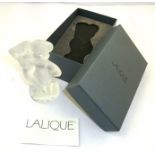 A LALIQUE "FAUNE" FIGURAL GROUP two frosted crystal glass figures entwined, seated upon a fruiting