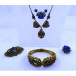 FIVE PIECES OF CZECH JEWELLERY; bangle, brooch, ring, necklace and pendant of multi stone setting