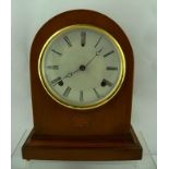 AN EDWARDIAN MAHOGANY CASED EIGHT DAY MANTEL CLOCK with chiming mechanism, white dial and Roman