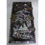 A 19TH CENTURY CHINESE BLACK LACQUERED AND MOTHER OF PEARL TABLE CASKET, the door opening to