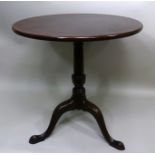 A GEORGE III MAHOGANY SNAP TOP SUPPER TABLE having single piece top, raised on turned stem and