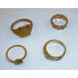 A 9CT. GOLD SIGNET RING, monogrammed, and THREE OTHER GOLD RINGS, variously set, mixed sizes