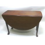 A GEORGE III MAHOGANY OVAL DROPLEAF DINING TABLE raised on pad feet supports, 106cm