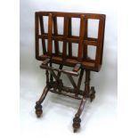 A 19TH CENTURY MAHOGANY FOLIO STAND, ratchet mechanism on turned wood frame with outswept
