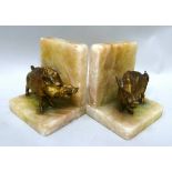 A PAIR OF EARLY 20TH CENTURY CONTINENTAL BOOK ENDS alabaster with gilt metal boar mounts, 12cm high