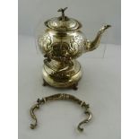 AN EPNS VICTORIAN STYLE KETTLE-ON-STAND, having repousse body, on a spun spirit holder