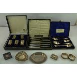 JOSEPH ROUND AND SON LTD A SET OF FOUR SILVER GRAPEFRUIT SPOONS, Sheffield 1914/15 in presentation