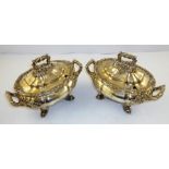 A PAIR OF GEORGIAN DESIGN SILVER PLATED SAUCE TUREENS, each having twin handle, lobed body form with