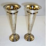 WILLIAM COMYNS AND SONS A PAIR OF LATE VICTORIAN SILVER TRUMPET FORM VASES with flared rims and