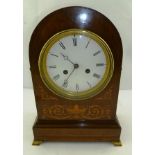 AN EDWARDIAN INLAID MAHOGANY CASED MANTEL CLOCK, having white enamel dial with Roman numerals, eight