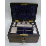 A LATE VICTORIAN COROMANDEL VANITY BOX, having EPNS capped glass jars and boxes within, 18cm x 31cm