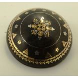 A 19TH CENTURY TORTOISESHELL CIRCULAR BROOCH inlaid with probable precious metals, having central