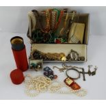 AN EXTENSIVE QUANTITY OF COSTUME JEWELLERY to include; a Victorian agate kilt brooch, a silver
