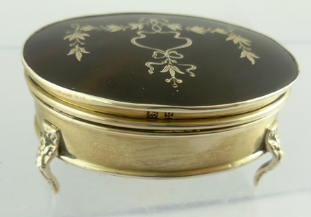 A GEORGE V DRESSING TABLE BOX by Mappin and Webb, silver framed with tortoiseshell inset hinged