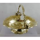 HUKIN & HEATH AN OVAL EPNS FRUIT BASKET having entwined up and over handle, pressed floral oval bowl