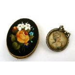 A VICTORIAN PIETRA DURA BROOCH, the coloured stones depicting flowers on a slate ground, pin