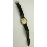 A ROLEX OYSTER GENTLEMAN'S VINTAGE WRIST WATCH, the dial inscribed "shock resisting" stainless case,