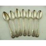 A MATCHED COLLECTION OF SEVEN MOSTLY GEORGIAN AND VICTORIAN SILVER DESSERT SPOONS, fiddle, thread