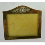 CHARLES AND WALTER PADGETT AN EDWARDIAN SILVER PHOTOGRAPH FRAME, the arched top with floral and