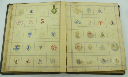 A HALF CALF BOUND VOLUME "ARMS, CRESTS, & MONOGRAMS." containing approximately 33 self completed - Image 4 of 10