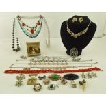 A GOOD SELECTION OF COSTUME JEWELLERY comprising; four matched suites of necklace/earrings,