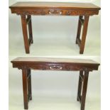 A PAIR OF CHINESE ELM ALTAR OR SIDE TABLES, c1900 frieze carved in the round with fruiting vines and