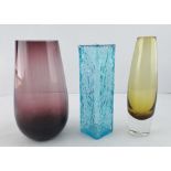 A BLUE GLASS VASE in the style of Whitefriars with bark effect finish, an AMETHYST GLASS VASE, and