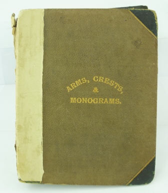 A HALF CALF BOUND VOLUME "ARMS, CRESTS, & MONOGRAMS." containing approximately 33 self completed