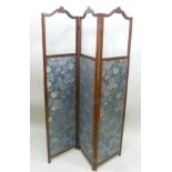 AN EDWARDIAN MAHOGANY FRAMED THREE-SECTION MODESTY SCREEN, fabric and glass panelled with string