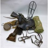 A VINTAGE LEATHER WESTERN SADDLE with original stirrups, water bottle and bedding roll, BRIDLE and a