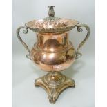 A 19TH CENTURY COPPER SAMOVAR, fitted two handles, the cover having acanthus leaf knop, on a