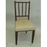 A VICTORIAN TURNED BOBBIN FRAMED SINGLE CHAIR with upholstered seat, slatted bobbin back and