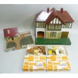 A TRI-ANG DOLL'S HOUSE of mock Tudor design, 48cm wide, a COTTAGE IN A FARMYARD, and TWO BOXES OF "