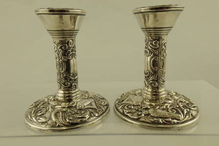 BLOW & CO A PAIR OF PRESSED DECORATED SILVER DWARF CANDLESTICKS each having worked integral - Image 3 of 6