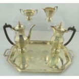 JOSEPH GLOSTER LTD. A FOUR-PIECE SILVER COFFEE SET AND MATCHING TRAY of octagonal panelled design