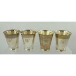SPINK & SON A SET OF FOUR PLAIN CONICAL SILVER GOBLETS, each monogrammed "J.W." with heavy wire