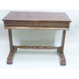 A 19TH CENTURY MAHOGANY SIDE TABLE fitted with two frieze drawers raised on trestle end supports