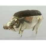 ADIE & LOVEKIN LTD. AN EDWARDIAN NOVELTY SILVER PIG DESIGN PIN CUSHION, Birmingham 1904, 5cm long