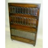 A GLOBE WERNICKE "CLASSIC" OAK BOOKCASE, fitted three leaded glass up and over front sections and