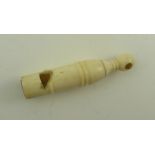 A 19TH CENTURY CARVED BONE WHISTLE, probably Napoleonic prisoner of war work, 5cm long